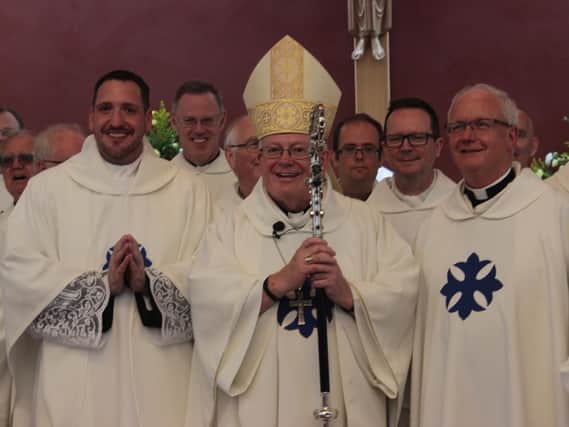 Left to right: Michael, Bishop Peter Doyle, Bishop of Northampton and Monsignor Sean Healy, parish Priest of St Augustines, Daventry and the Diocesan Vicar General.