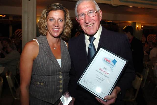 Ted Sharp with Sally Gunnell and his Pride in Northamptonshire Award in 2005