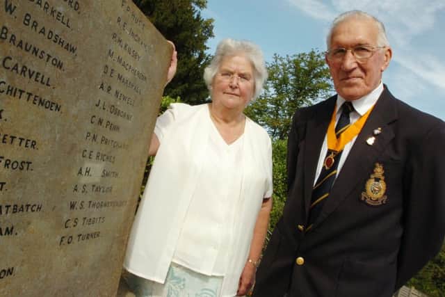 Ted Sharp with Gill Douglas in front of the War Memorial in Abbey Street, Daventry