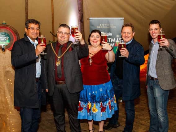 The launch of the Carlsberg Christmas beer - unique to Northampton - that is raising money for Northamptonshire Community Foundation