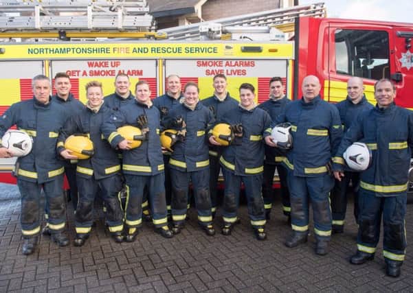 The new NFRS recruits (yellow helmets) with their NFRS trainers (white helmets) NNL-170112-102413005
