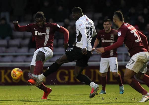 Aaron Pierre clears the danger against Walsall