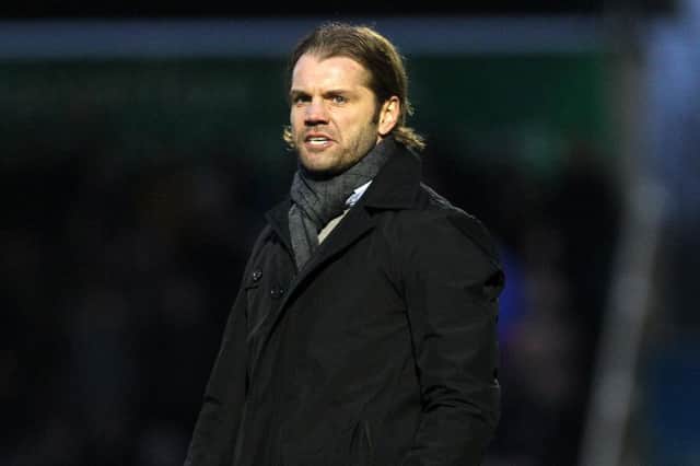 FINAL STRAW: MK Dons' defeat at Sixfields on Saturday saw the end of Robbie Neilson. Pictures: Sharon Lucey