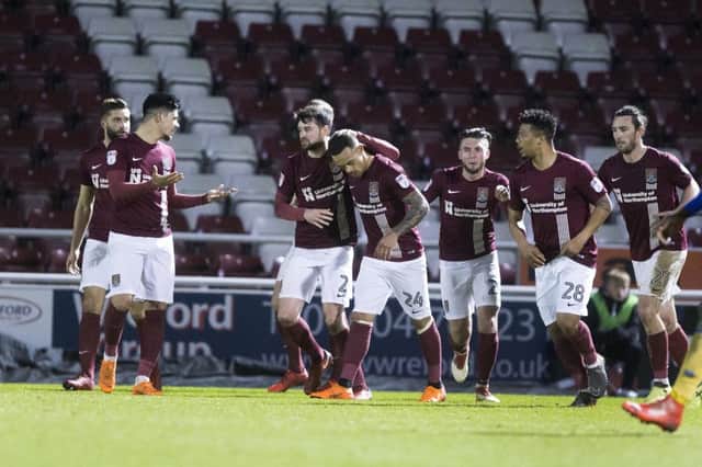 The Cobblers players celebrate Shay Facey's goal against Shrewsbury Town on Tuesday (Picture: Kirsty Edmonds)