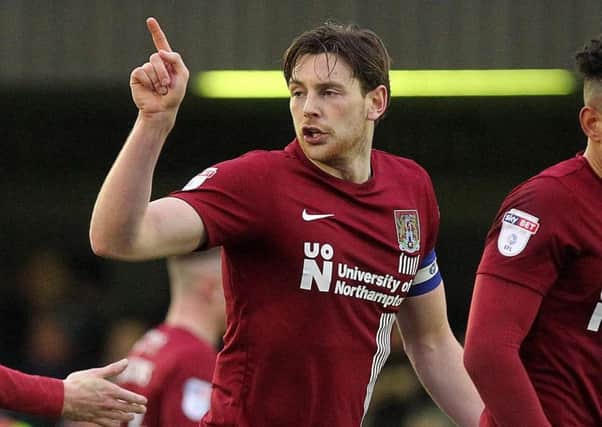 UP FOR THE FIGHT - Cobblers skipper Ash Taylor