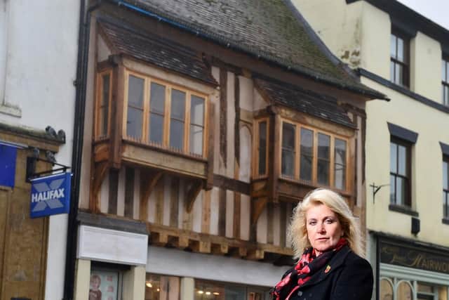 Dawn Branigan outside First Light Photography on Daventry High Street