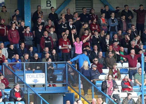 The Cobblers supporters backed their team in numbers at Bury on Saturday (Pictures: Sharon Lucey)
