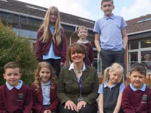 Headteacher Jacqui Johnson and pupils from Ashby Fields Primary School, pictured in 2015.