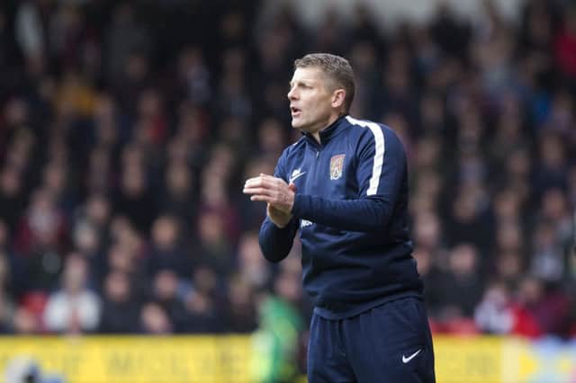Dean Austin on the touchline during Saturday's defeat at Walsall. Pictures: Kirsty Edmonds