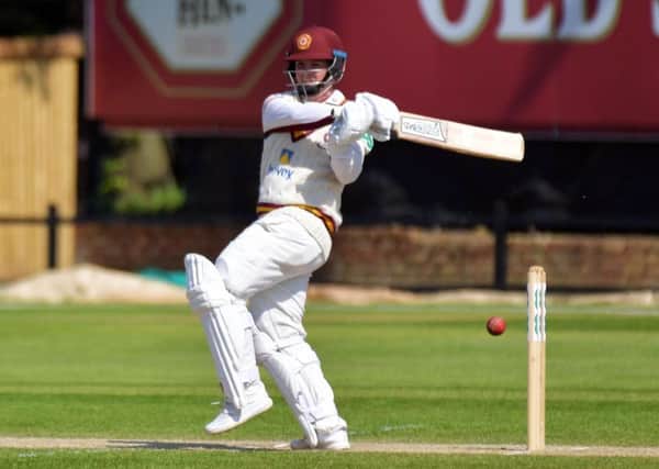 Rob Newton hits out on his way to an unbeaten century for Northants against Pakistan (Pictures: Dave Ikin)