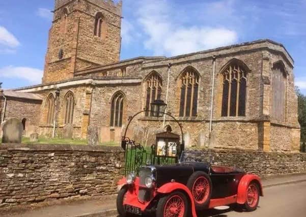 A 1931 Alvis Silver Eagle outside the Watford village Church of St Peter & St Paul