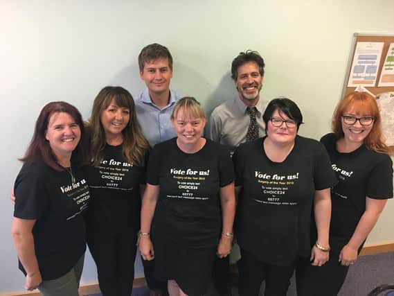 Danetre Medical Practice staff wear their 'Vote for us!' t-shirts