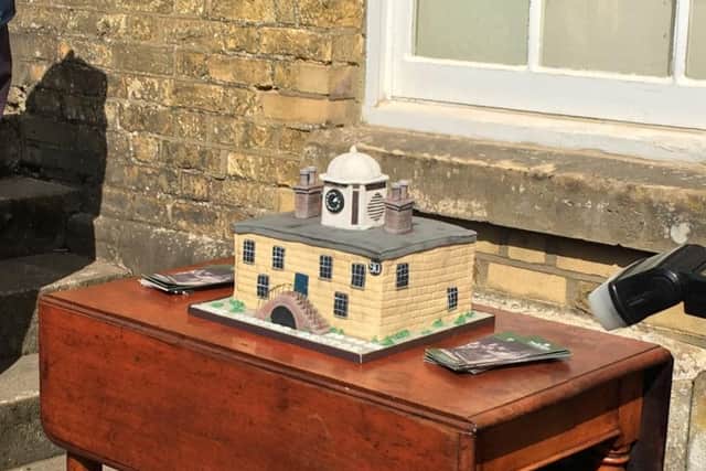 A cake in the form of the visitor centre was made for the launch