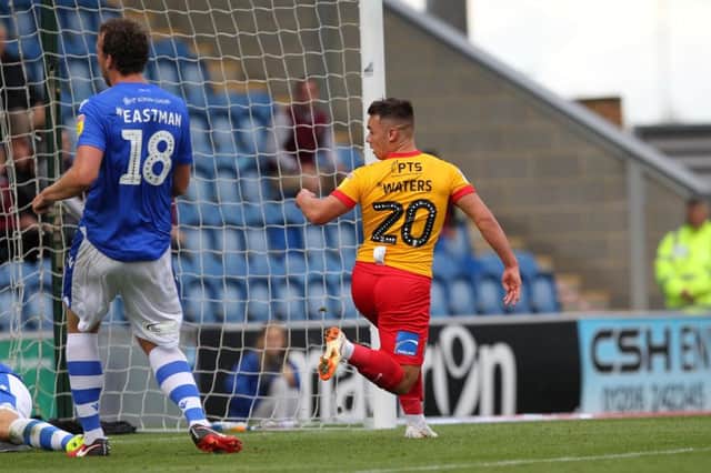 THAT'LL DO: Billy Waters taps home to double Town's lead at Colchester United on Saturday and all-but secure their first victory of the season. Pictures: Sharon Lucey