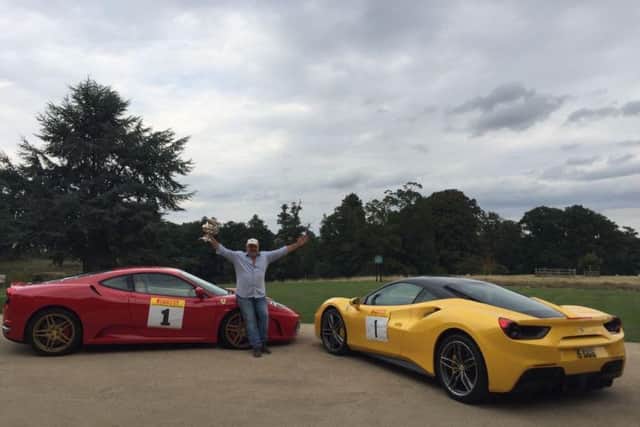 Dave poses next to the red F430 that helped him claim his second title and with the yellow twin turbo F488 which he hopes will deliver his third championship win