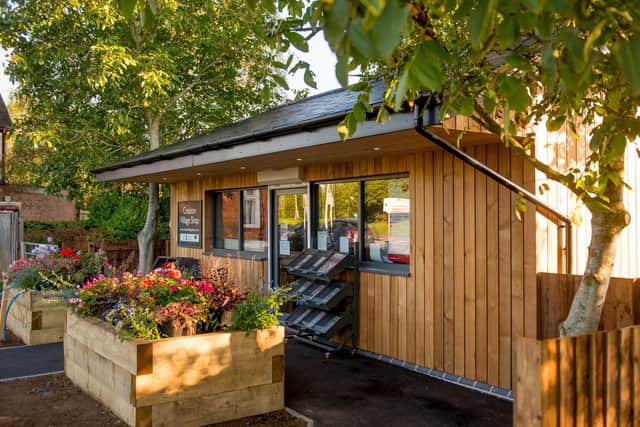 The new store has a Post Office and sells local produce