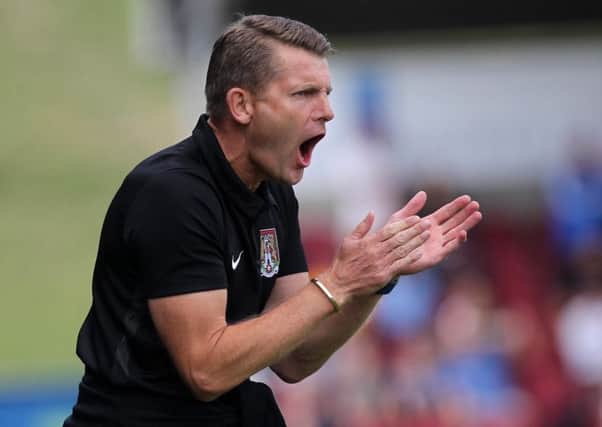 HAD ENOUGH: Cobblers boss Dean Austin has warned his squad that no-one's position in the team is safe