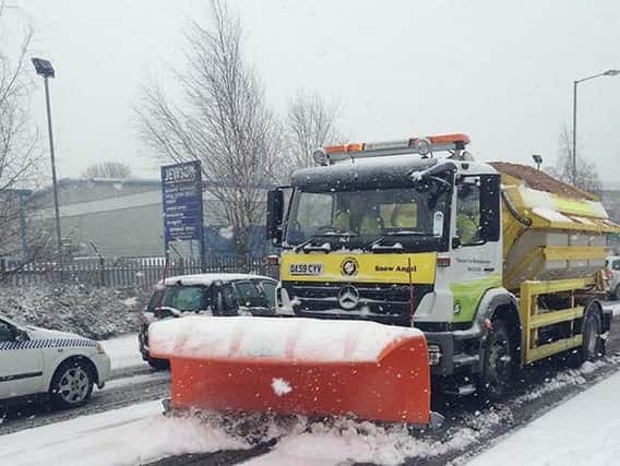 Snowplough clearing the county roads during bad weather.