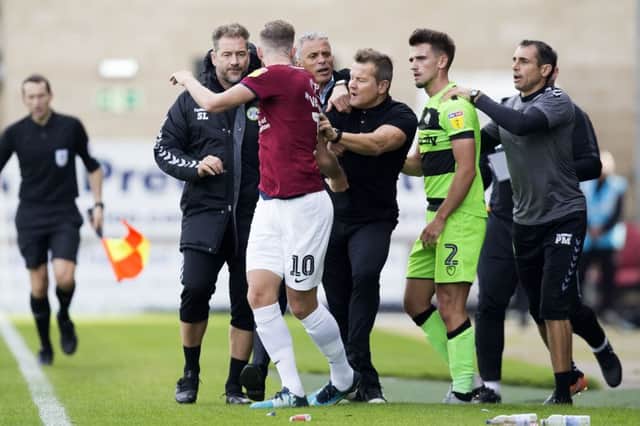 SCUFFLE: Mark Cooper and Kevin van Veen were involved in a tangle during the closing stages of Saturday's win. Picture: Kirsty Edmonds
