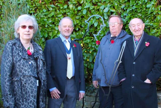 From left: deputy Leader of DDC Cllr Liz Griffin, Daventry deputy mayor Cllr Mike Arnold, Chairman of the Daventry branch of the Royal British Legion Chris Ward, and Cllr Alan Hills unveil the Tommy silhouette