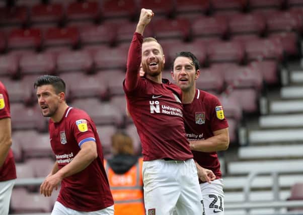 Kevin van Veen celebrates after scoring his penalty in the 2-1 win over Oldham