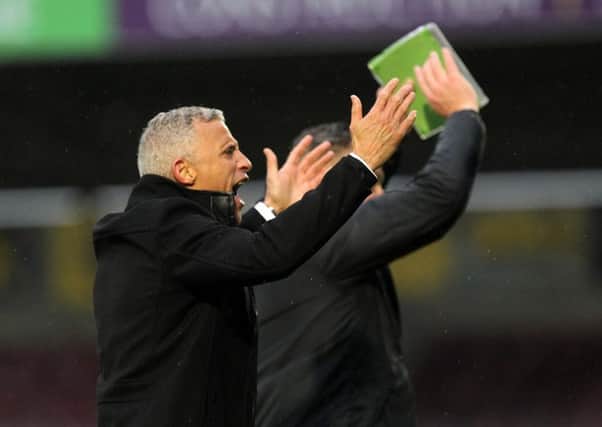 Keith Curle celebrates with the fans after the win over Oldham (Picture: Sharon Lucey)