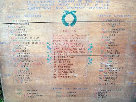 The restored memorial board - pictured here as it looked four years ago before its makeover - will be unveiled in the village hall on Remembrance Sunday