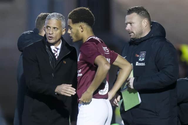 Keith Curle with Cobblers youngster Jay Williams