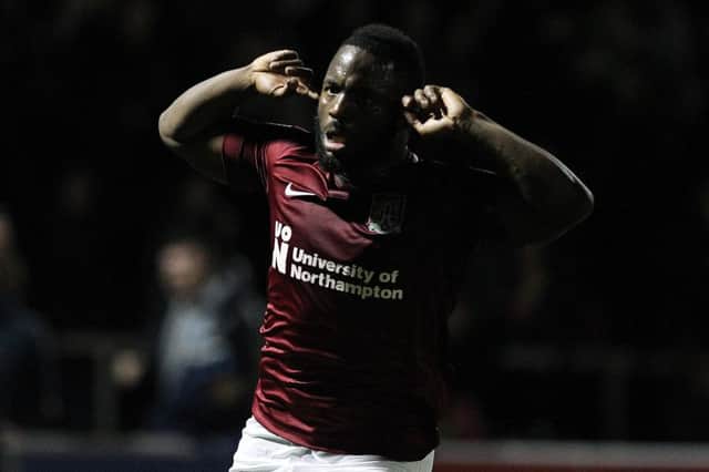 BOOM! Junior Morias wheels away in delight after grabbing a last-gasp equaliser for the Cobblers. Pictures: Sharon Lucey
