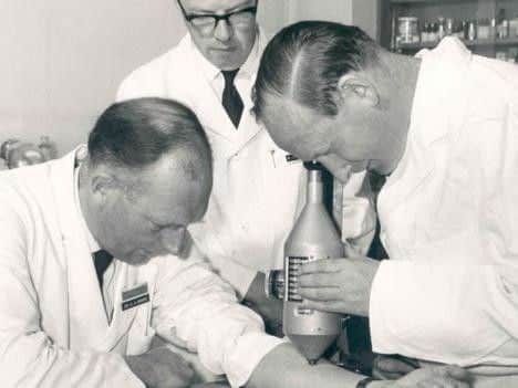 Dr Stewart Adams, Dr John Nicholson and Mr R Cobb studying degrees of inflammation using a colour intensity measuring device at Boots (Picture: Boots UK)