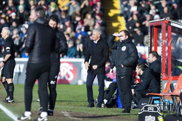 Things got a bit heated between Curle and Cowley on the touchline during Saturday's game. Picture: Kirsty Edmonds