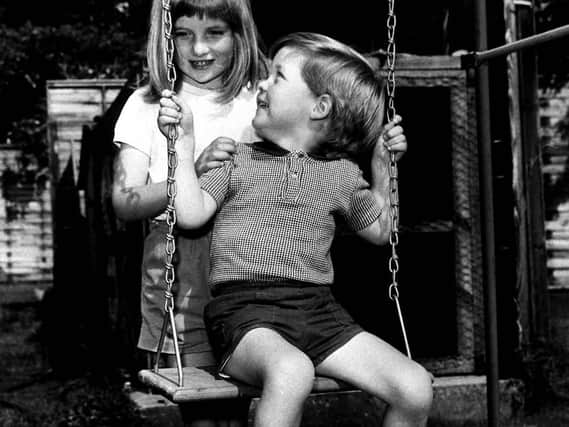 Lady Diana Spencer, aged eight, pictured in 1967 with her brother, Charles, now Earl Spencer, grew up at Althorp House near Great Brington