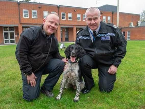 Pictured left-right: PC Ian McDonald, police dog Charlie and Assistant Chief Constable Simon Blatchly.