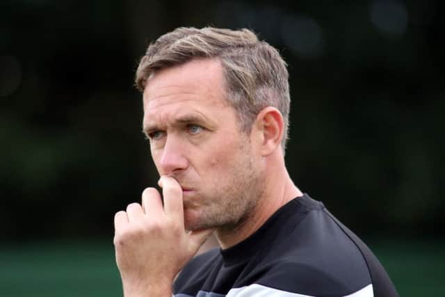 Daventry Town manager Aaron Parkinson will be looking to complete the double on Monday