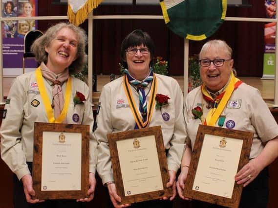 From left, dedicated Scout leaders Rosemary Verner, Mary Adams and Dorothy Parton, receiving their top awards at The Guildhall in Northampton recently.