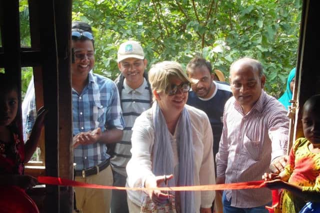 Gaynor cuts the ribbon for the new pre-school