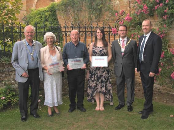 Representatives from Daventry Museum with dignitaries at the Northamptonshire Heritage Forum Awards.