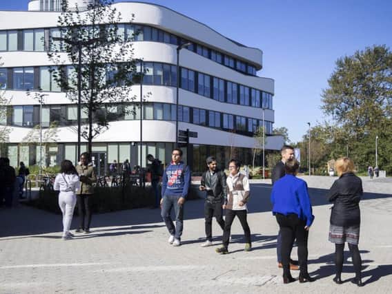 The university says a department restructure has led to 14 redundancies.