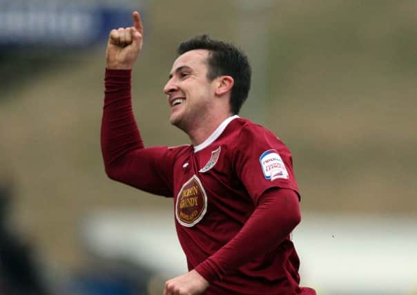 GET IN THERE! - Roy O'Donovan celebrates his goal against Accrington (Picture: Kelly Cooper)