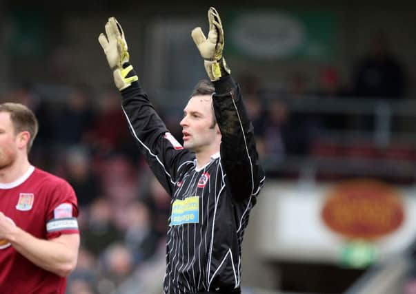 HANDS UP IF THE COBBLERS' SECOND GOAL WAS YOUR FAULT - Accrington goalkeeper Paul Rachubka (Picture: Kelly Cooper)