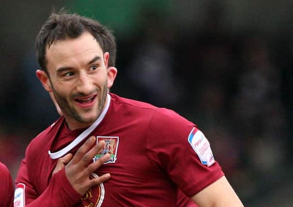 JUST ANOTHER GAME - Cobblers winger Chris Hackett comes up againts his hometown club Oxford United on Saturday