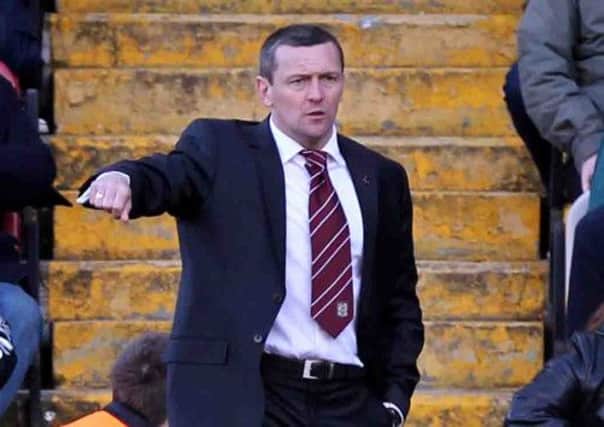 CONCENTRATING ON HIS OWN TEAM - Cobblers boss Aidy Boothroyd (Picture: Kirsty Edmonds)