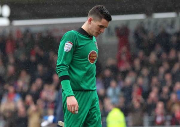 DEJECTION - Cobblers goalkeeper Lee Nicholls shows his disappointment following the defeat to York on Saturday (Picture: Sharon Lucey)