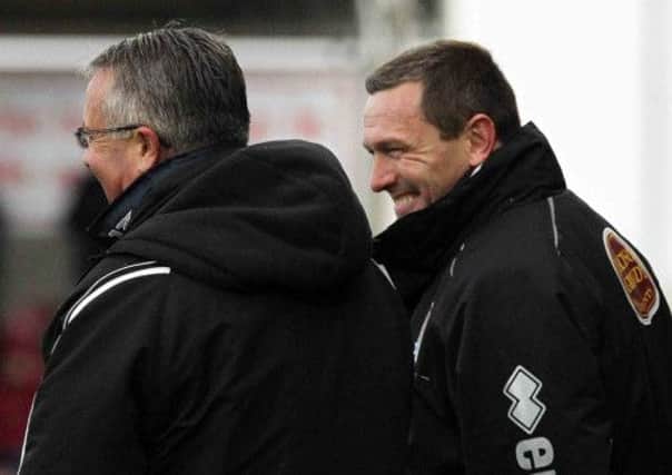 MUTUAL RESPECT - Aidy Boothroyd shares a joke with Port Vale boss Micky Adams