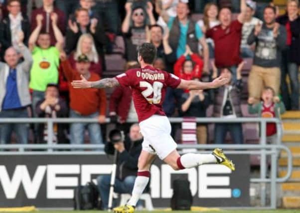 BREAKING THE DEADLOCK - Roy O'Donovan celebrates the only goal of the game in the Cobblers' win over Cheltenham on Thursday night (Picture: Kirsty Edmonds)