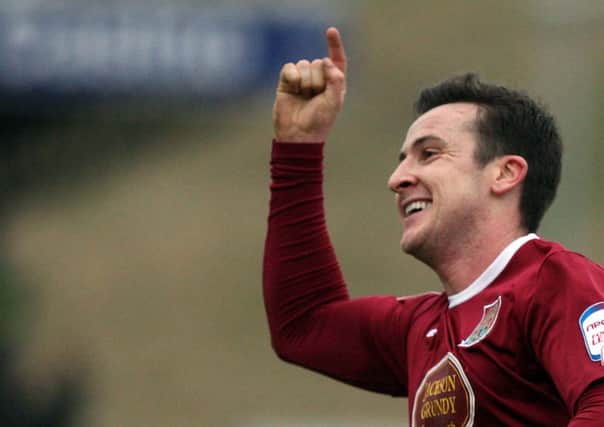 IN THE MIX - Cobblers striker Roy O'Donovan