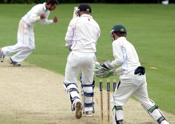THAT'S OUT - Saints claim a wicket during their premier division win over Oundle last Saturday (Picture: Kit Mallin)
