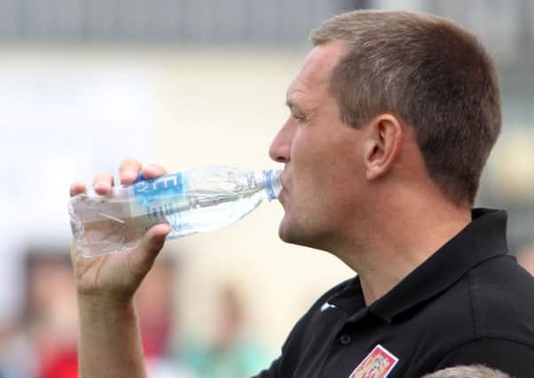THIRSTY WORK - Cobblers boss Aidy Boothroyd says the Town players have been worked extremely hard on the training camp in Croatia