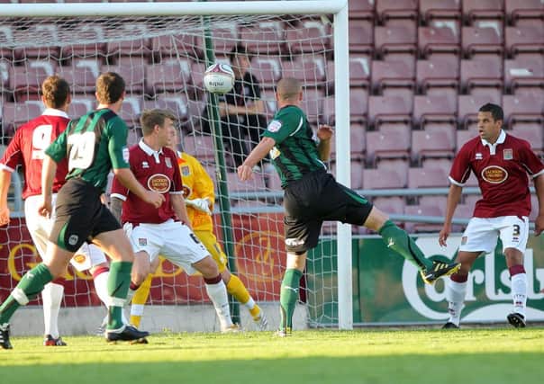 Cobblers scrap it out with Coventry City in a pre-season friendly at Sixfields in July 2010