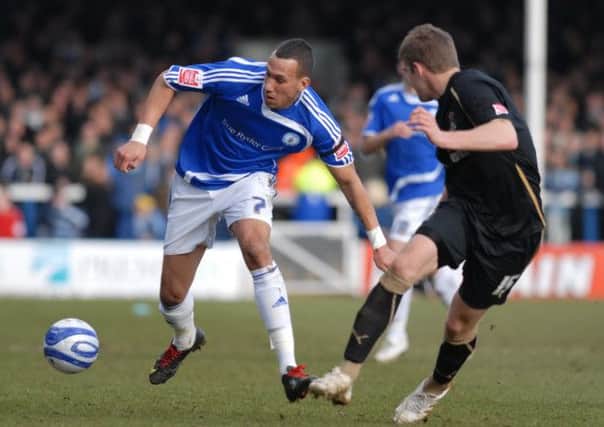 TARGET - Cobblers boss Aidy Boothroyd is keeping tabs on striker Liam Dickinson, seen here playing for Peterborough United